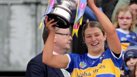 Karen Kennedy captain of the Tipperary team raising the cup after 20 years